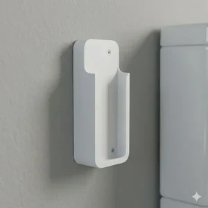 Magnetic wall mount holder for a bidet remote in a modern bathroom.